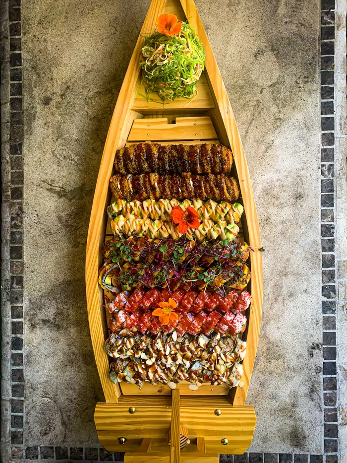 An Irimaki Signature sushi boat seen from above