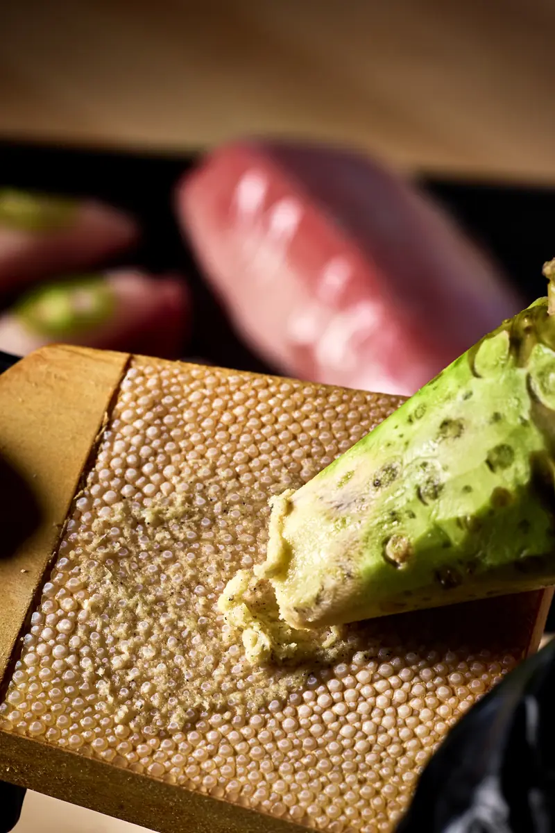 Fresh wasabi root on a grater